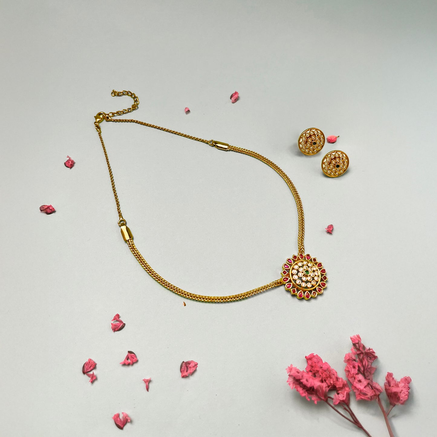 Ishita Gold and Ruby Studded Pendant Set