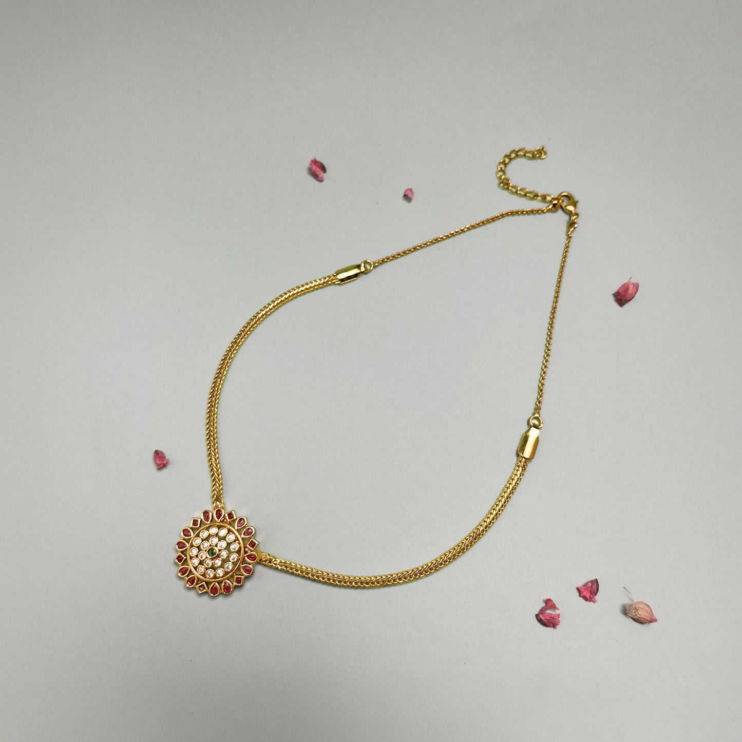 Ishita Gold and Ruby Studded Pendant Set