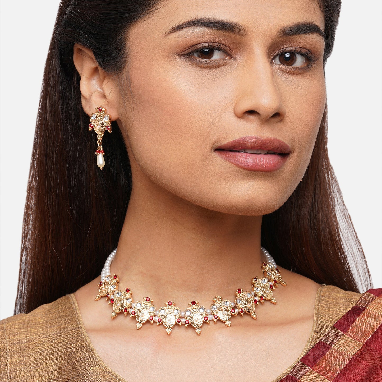 Gold Kundan And Pearl Jewelry Set